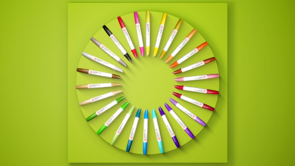 Talens | Pantone markers in a circle on a green background